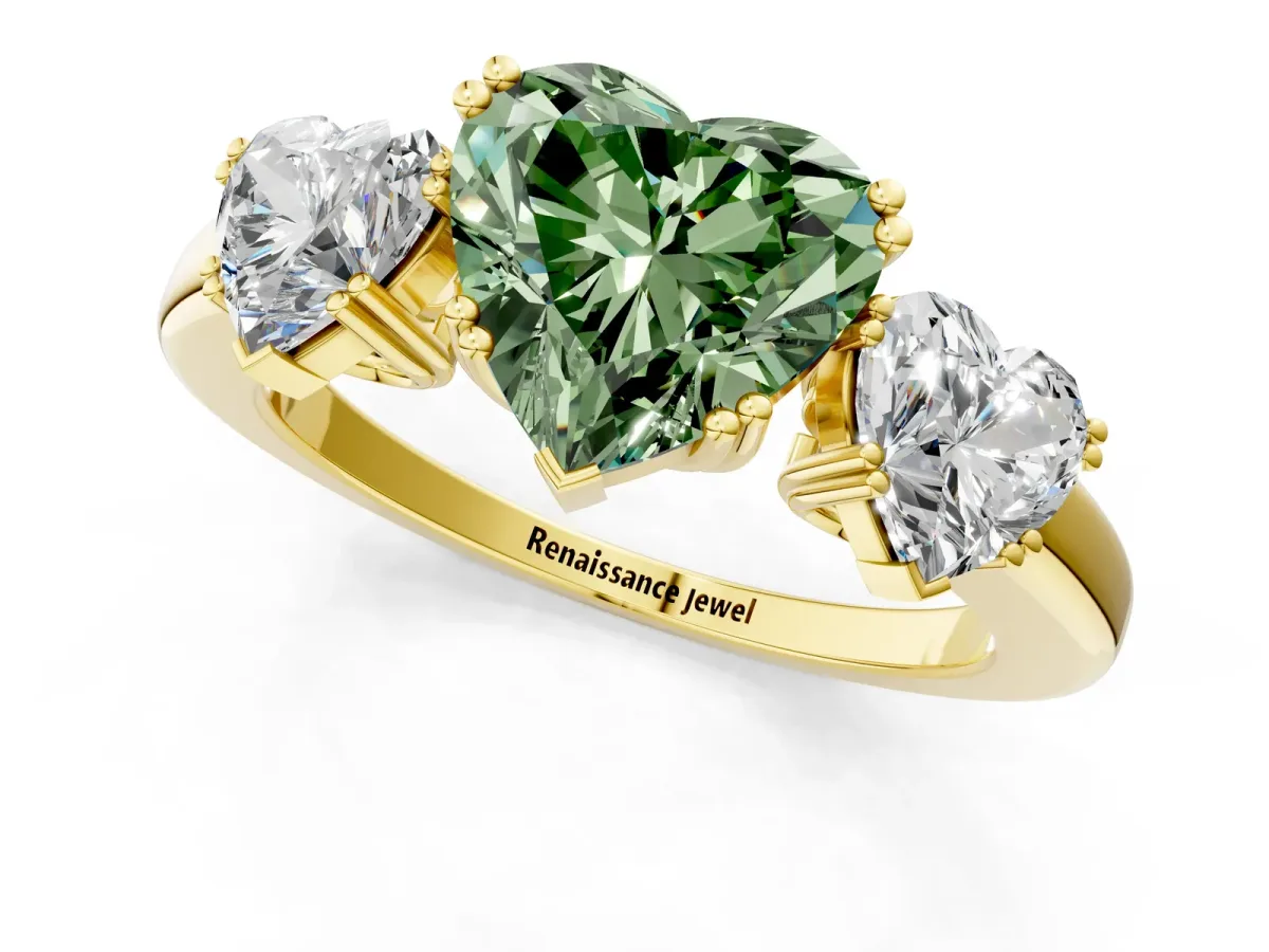 Fancy Green Three-Stone Heart Cut Cut Diamond Ring with Channel Set Band and Four-Prong Setting Yellow gold