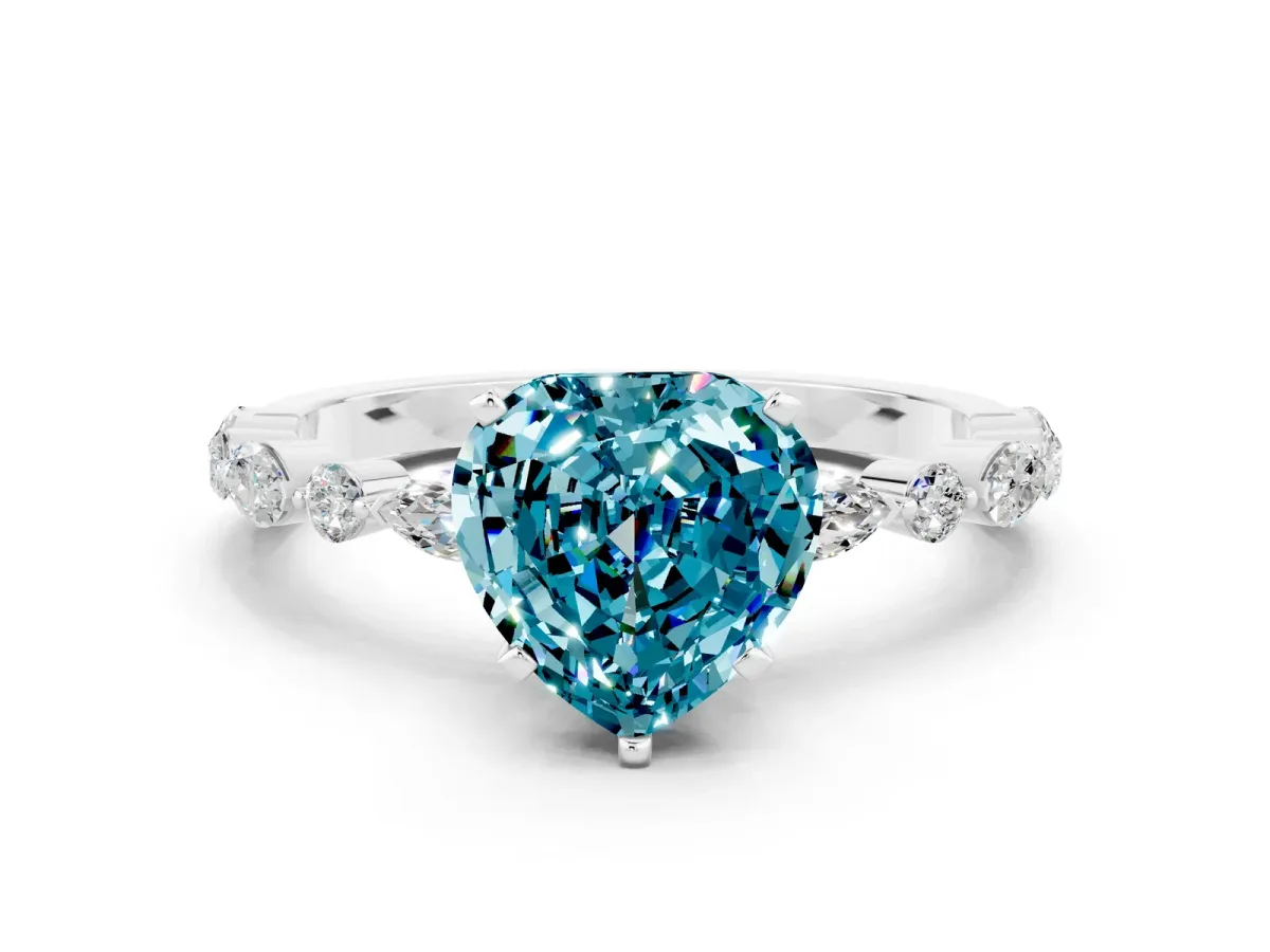 Heart Cut Blue Topaz Ring with Marquise and Round Side Stones and Four-Prong Setting White gold