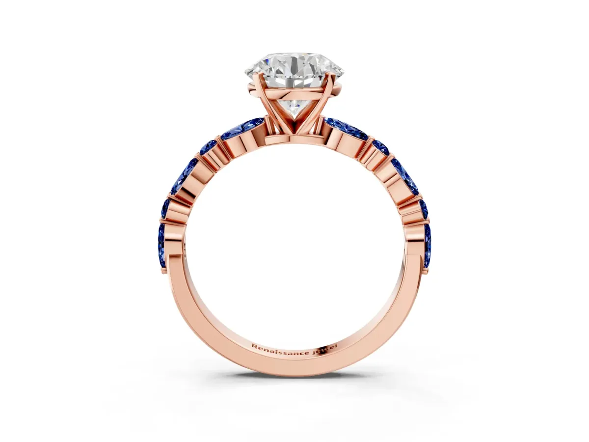 Round Cut Diamond Ring with Marquise and Round Blue Sapphire Side Stones and Four-Prong Setting Rose gold