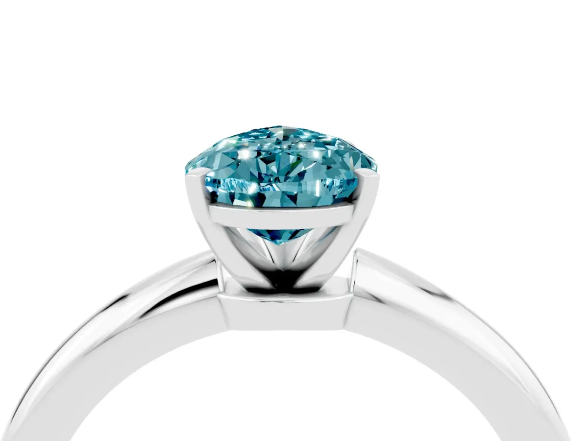 Pear Cut Blue Topaz Solitaire Ring with Six-Prong Setting and Classic Band Platinum