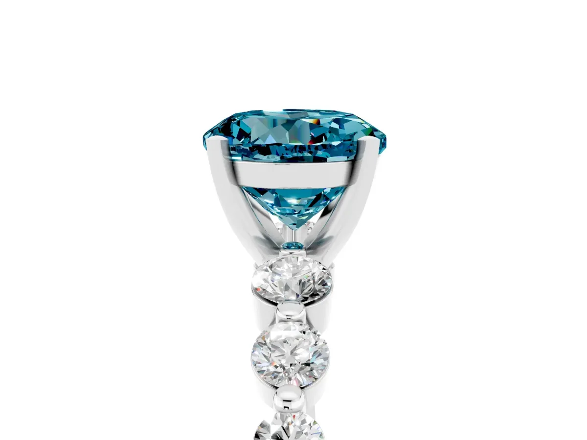 Round Cut Solitaire Blue Topaz Ring with Pave Band and Four-Prong Setting Silver