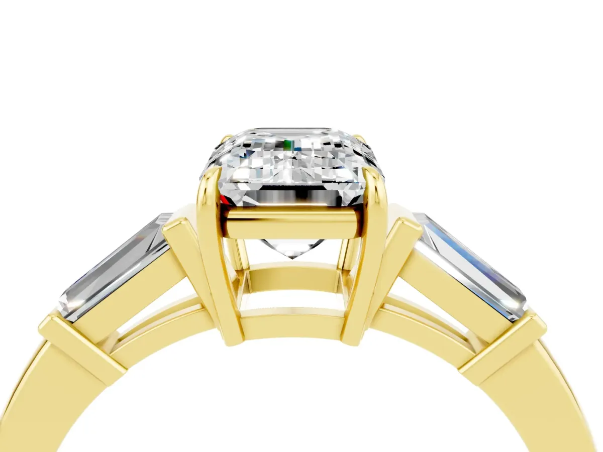 Emerald Cut Moissanite Three-Stone Ring with Tapered Baguette Side Stones and Prong Setting Yellow gold