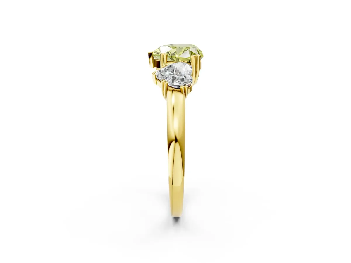 Fancy Yellow Three-Stone Heart Cut Cut Diamond Ring with Channel Set Band and Four-Prong Setting Yellow gold