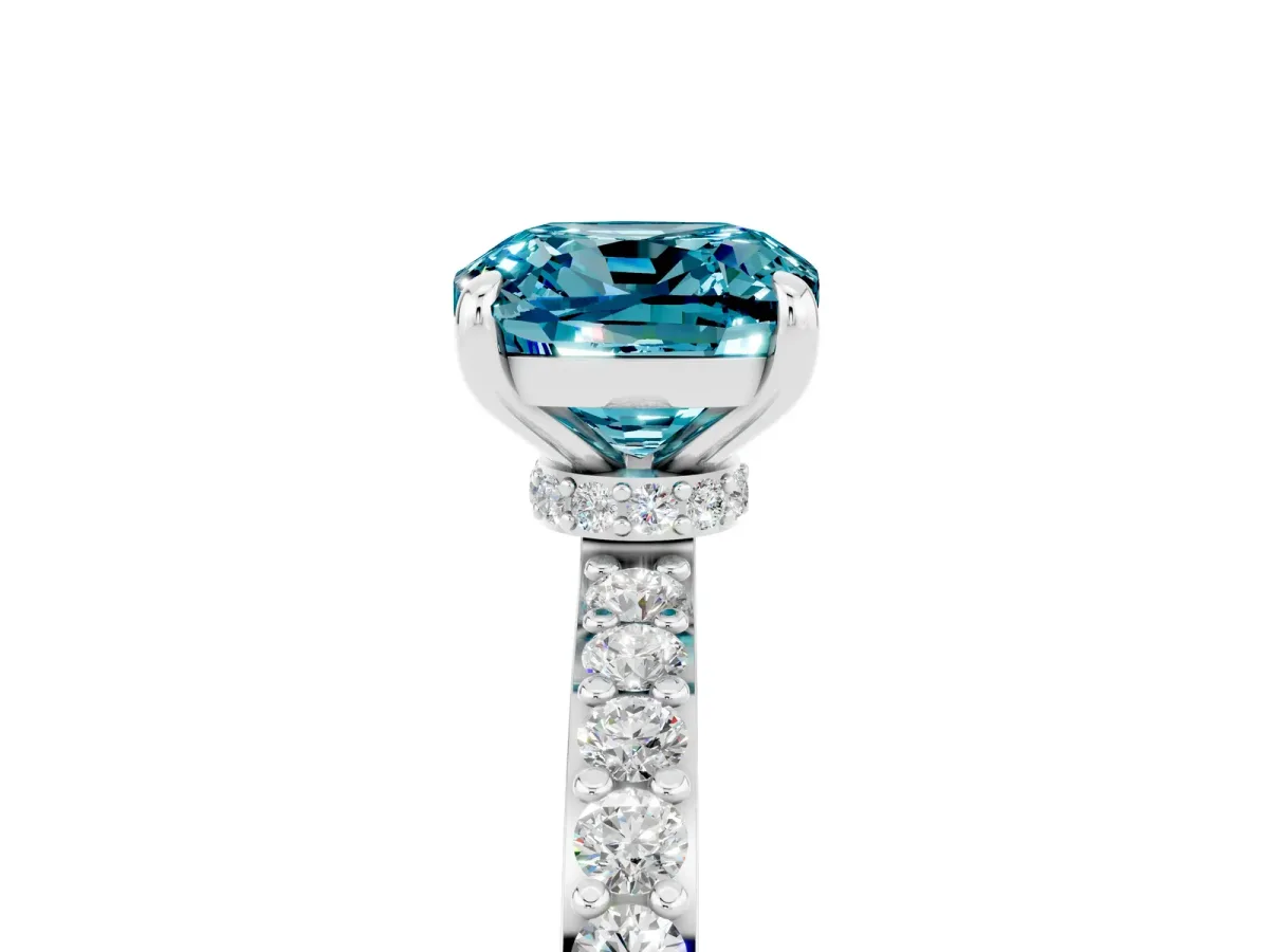 Cushion Cut Blue Topaz Solitaire Engagement Ring with Pavé Band and Four-Prong Setting White gold