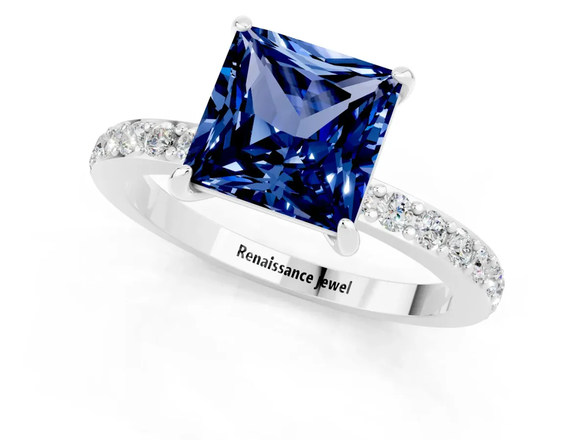Princess Cut Blue Sapphire Solitaire Engagement Ring with Pavé Band and Four-Prong Setting White gold