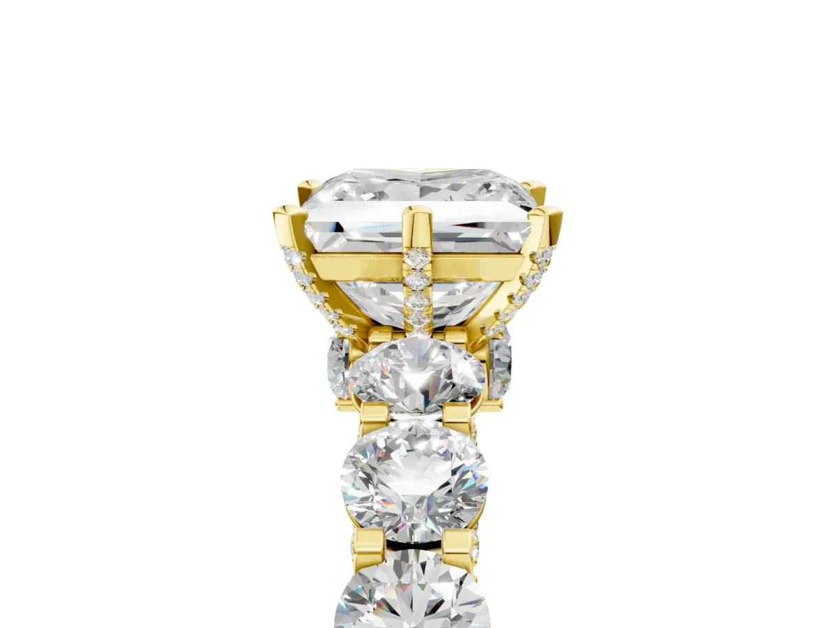 Princess Cut Diamond Side Stone Engagement Ring with Four-Prong Setting Yellow gold