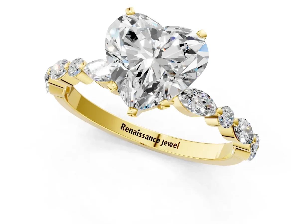 Heart Cut Diamond Ring with Marquise and Round Side Stones and Four-Prong Setting Yellow gold