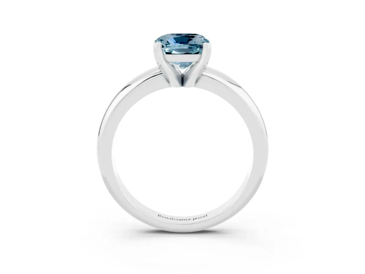 Cushion Cut Aquamarine Solitaire Engagement Ring with Round Band and Four-Prong Setting White gold