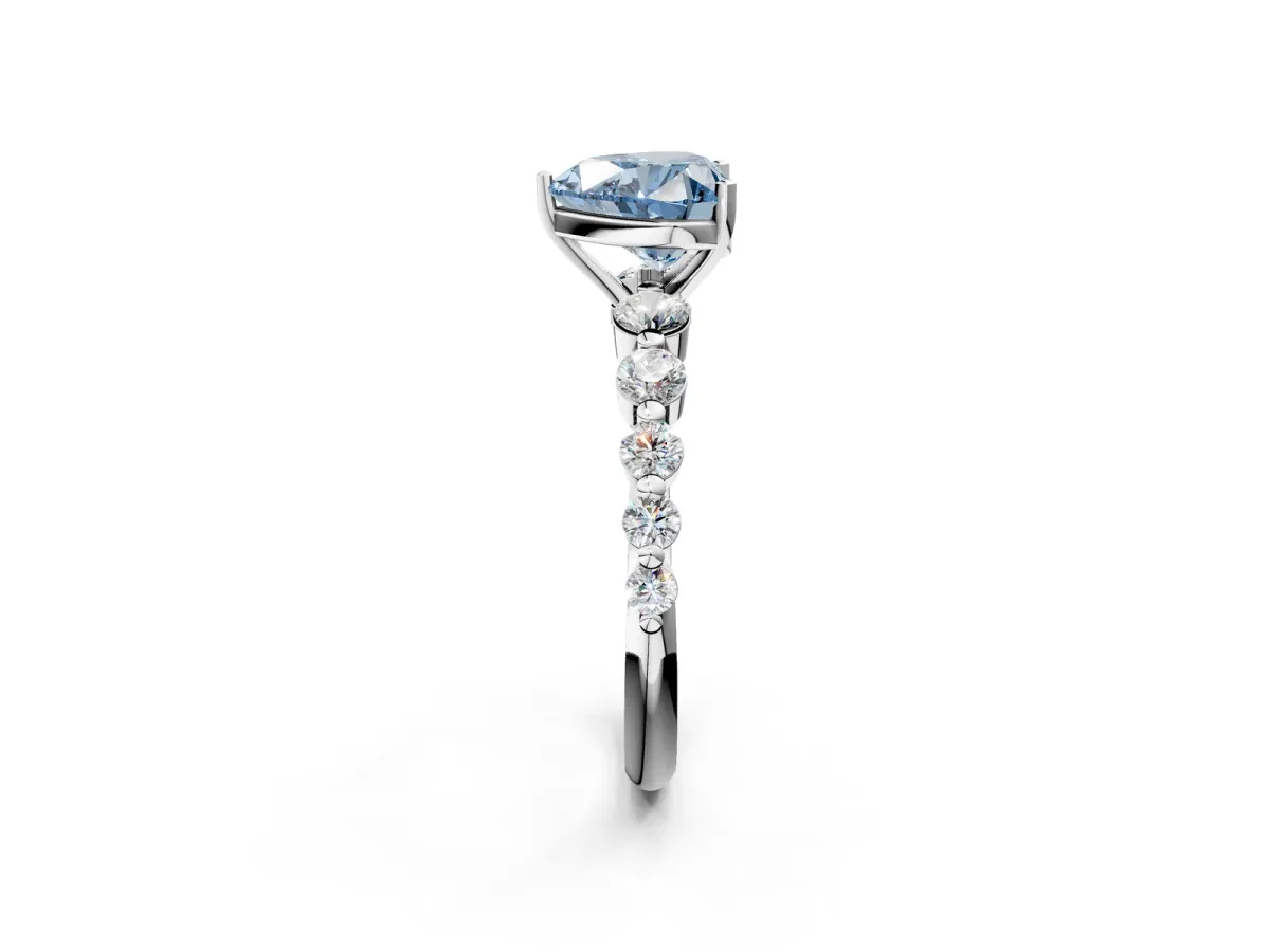 Fancy Blue Heart Cut Solitaire Diamond Ring with Pave Band and Four-Prong Setting Platinum