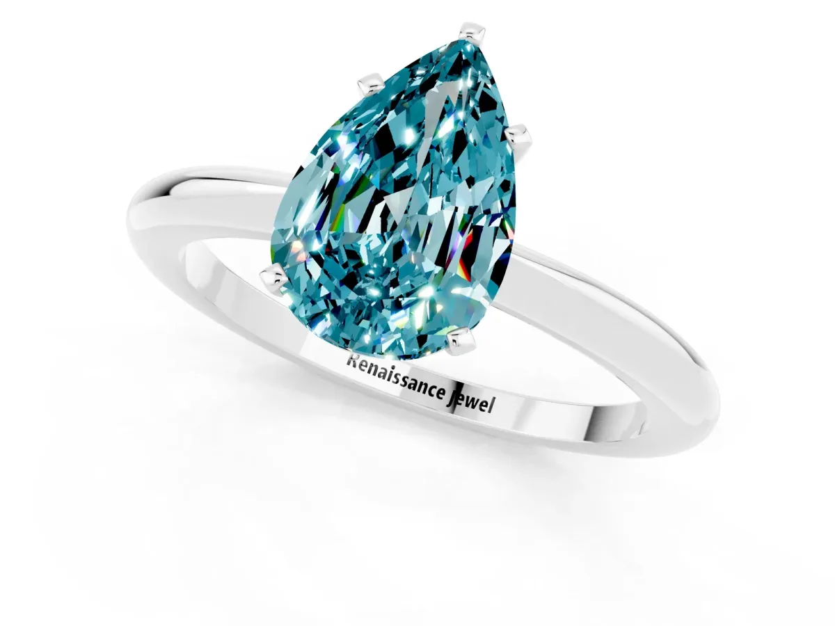 Pear Cut Blue Topaz Solitaire Ring with Six-Prong Setting and Classic Band Platinum