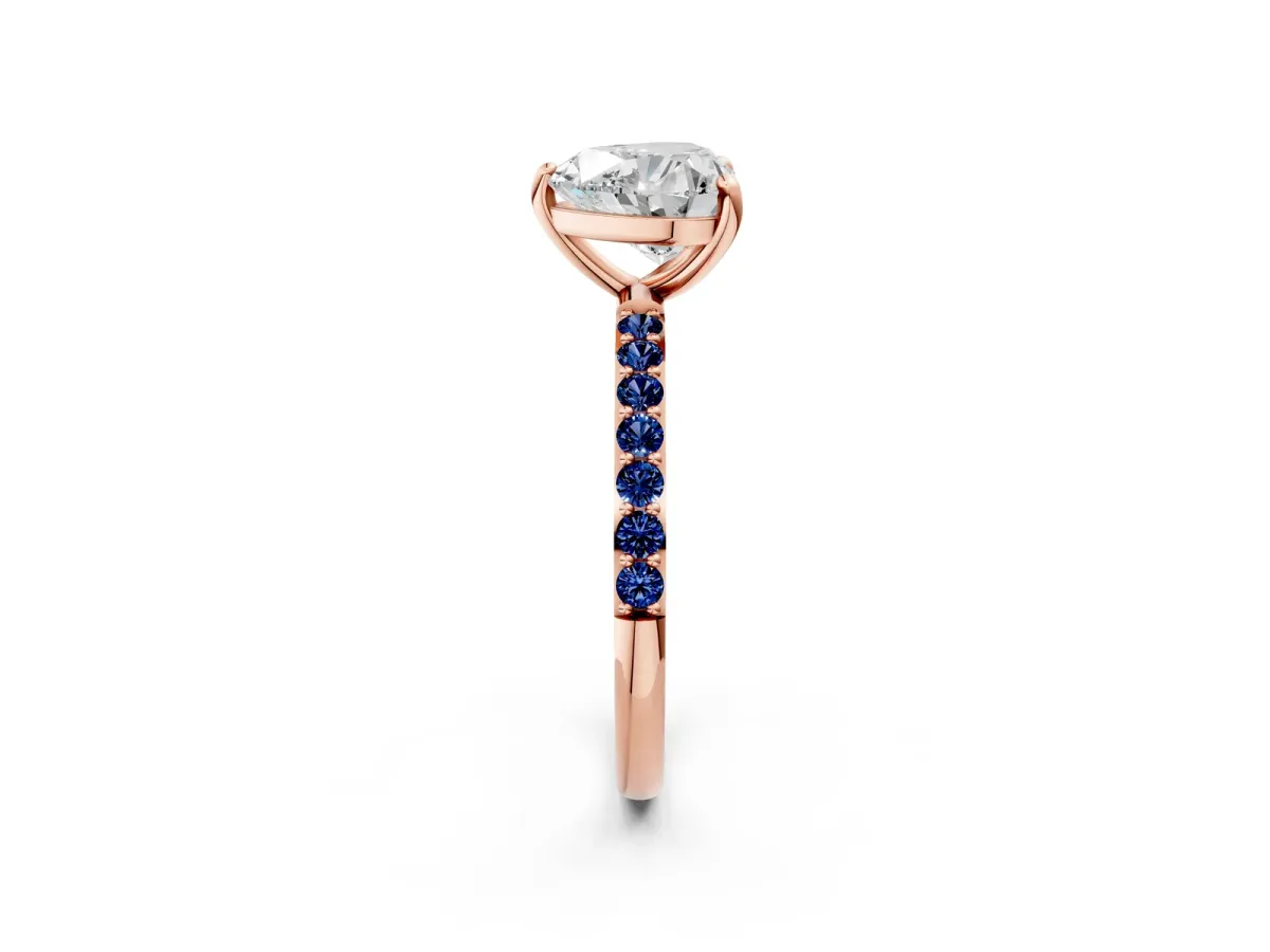 Heart Cut Diamond Solitaire Ring with Round Blue Sapphire Pavé Band and Prong Setting Rose gold