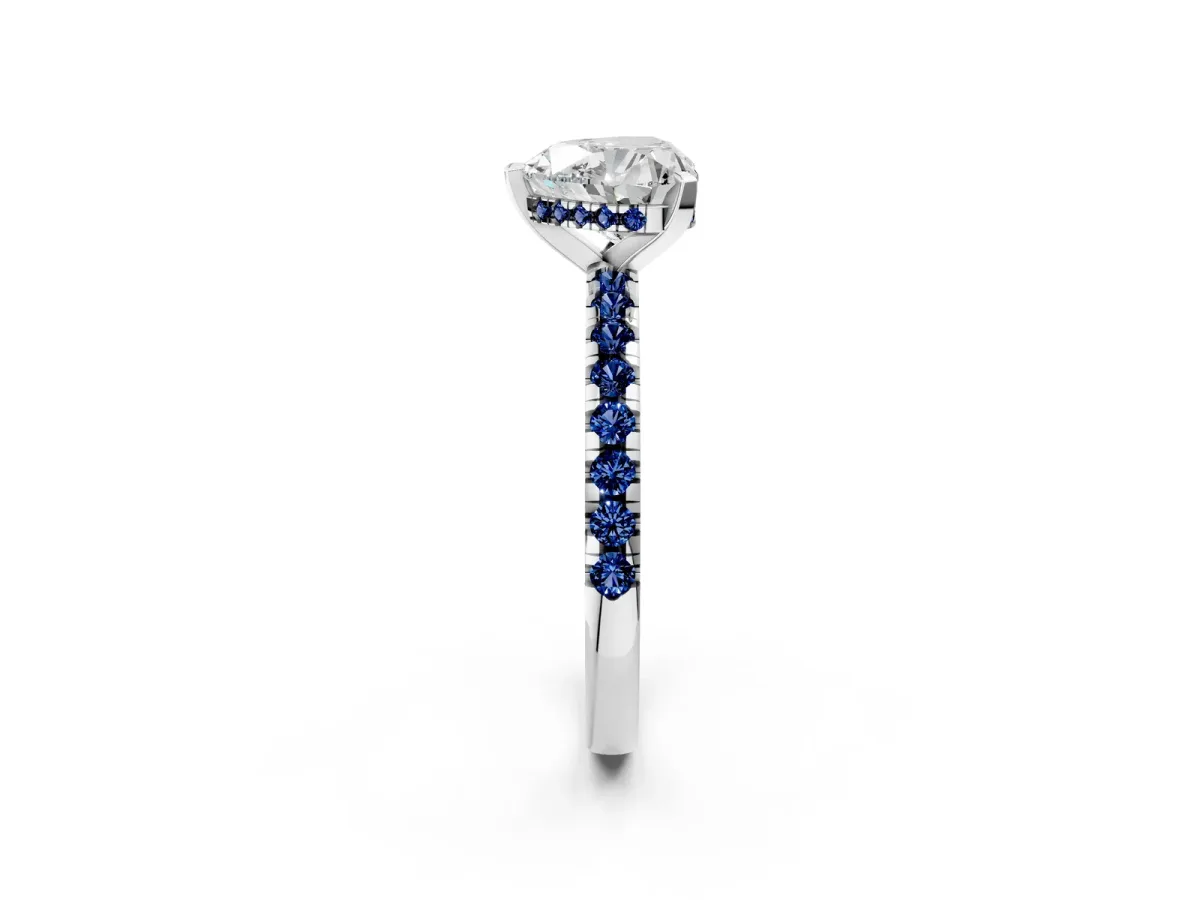 Heart Cut Diamond Solitaire Ring with Round Blue Sapphire Pavé Band and Four-Prong Setting White gold