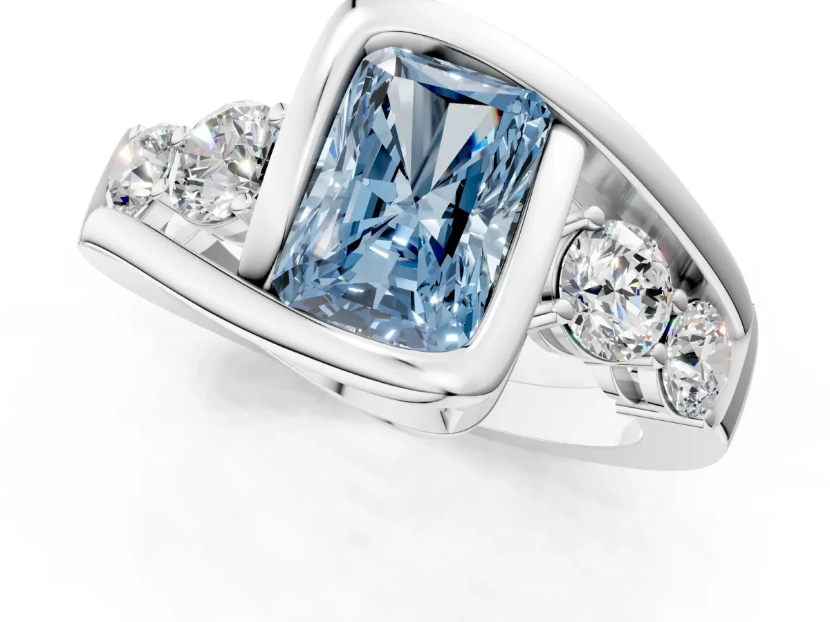 Fancy Blue Bezel Set Radiant Cut Diamond Bypass Ring with Round Accents Platinum