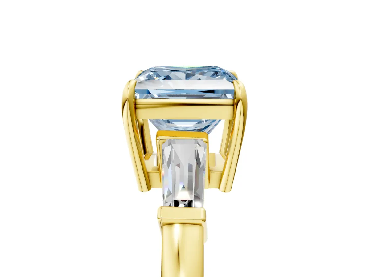 Fancy Blue Princess Cut Diamond Three-Stone Ring with Tapered Baguette Side Stones and Prong Setting Yellow gold