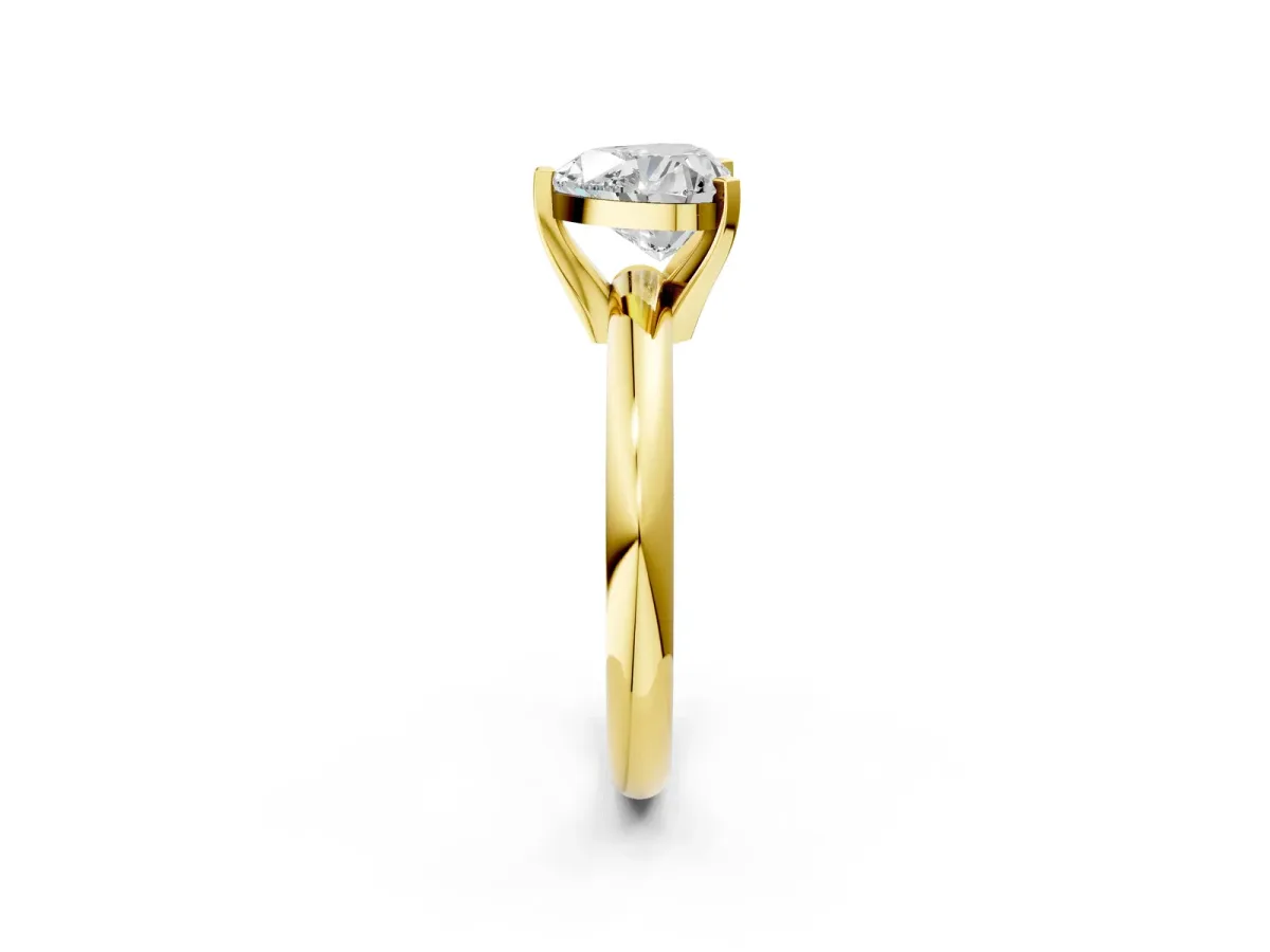 Heart Cut Diamond Solitaire Engagement Ring with Round Band and Four-Prong Setting Yellow gold