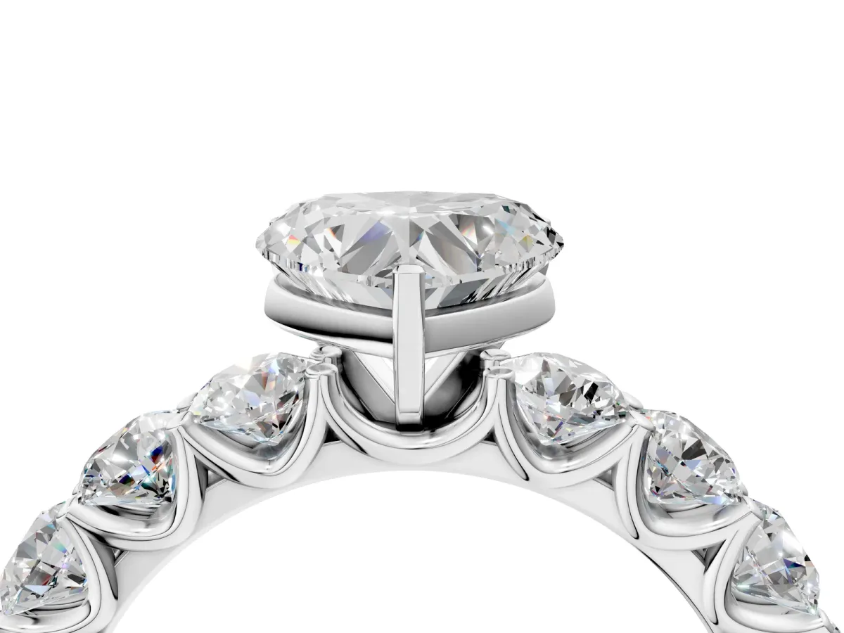 Heart Cut Diamond Prong Setting with Side Stones on a Pave Band Silver