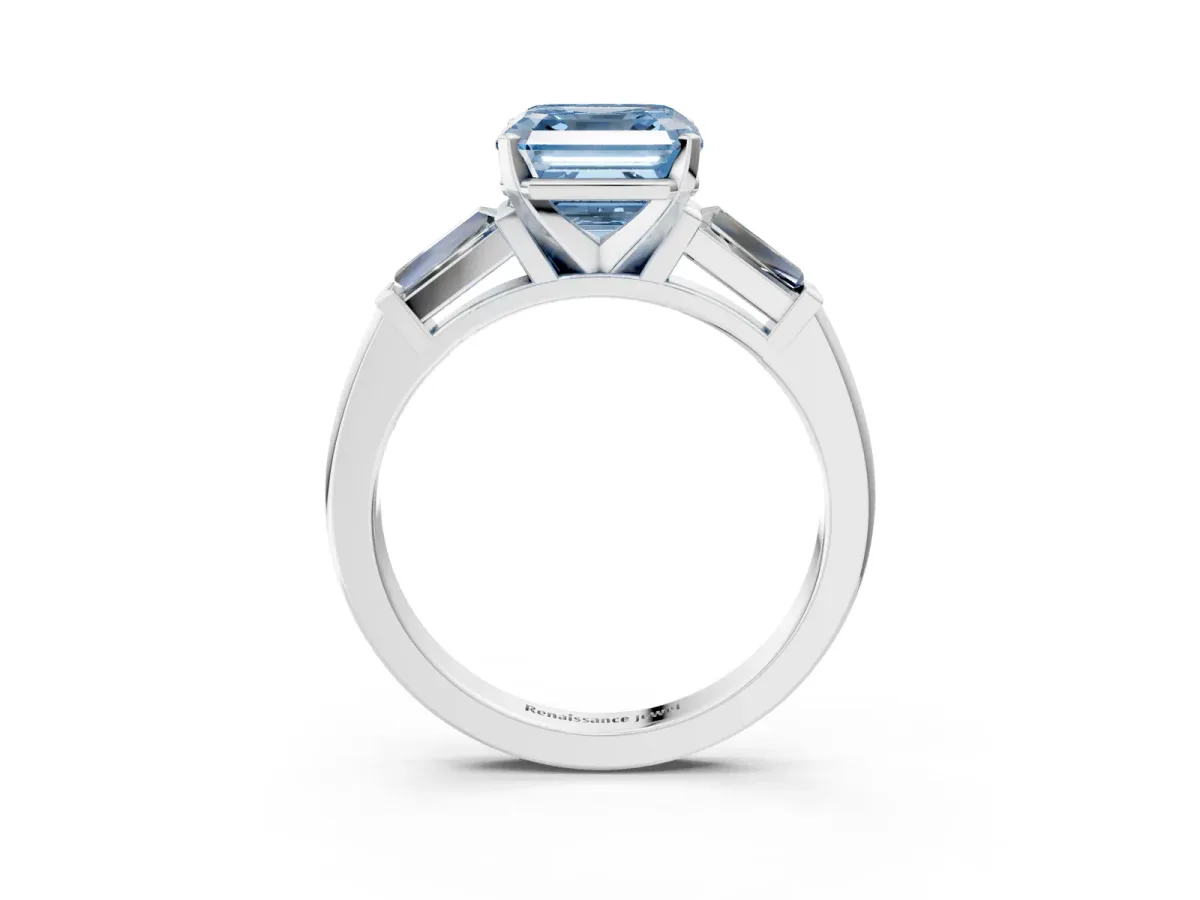 Fancy Blue Asscher Cut Solitaire with Tapered Baguette Side Stones on a Classic Band with Four-Prong Setting Platinum