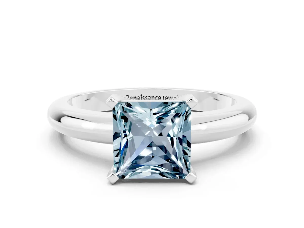Princess Cut Aquamarine Solitaire Engagement Ring with Round Band and Four-Prong Setting White gold