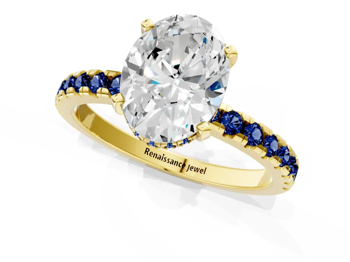 Oval Cut Diamond Solitaire Ring with Round Blue Sapphire Pavé Band and Four-Prong Setting Yellow gold