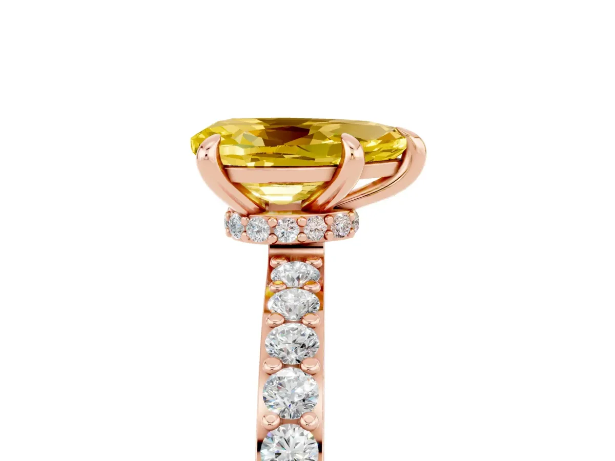 Pear Cut Yellow Sapphire Solitaire Engagement Ring with Pavé Band and Four-Prong Setting Rose gold