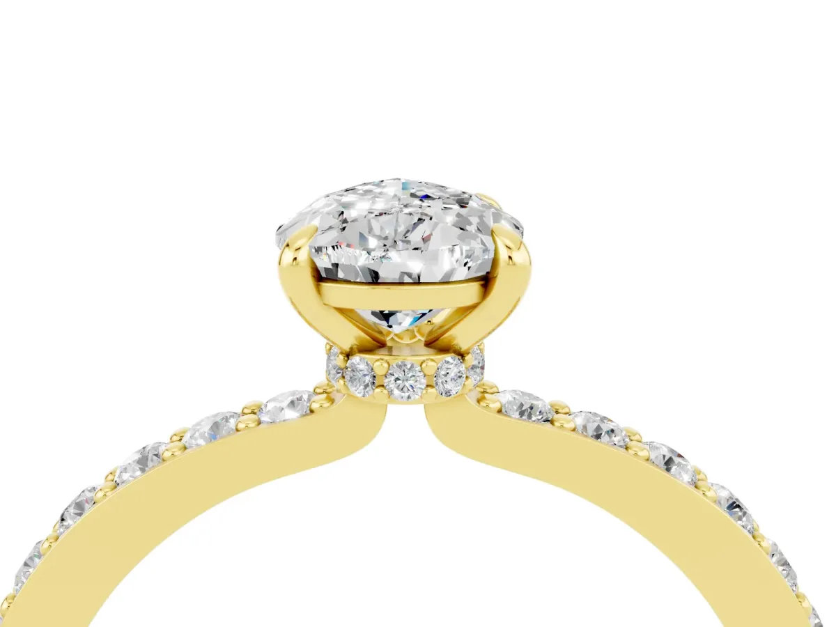Pear Cut Moissanite Solitaire Engagement Ring with Pavé Band and Four-Prong Setting Yellow gold