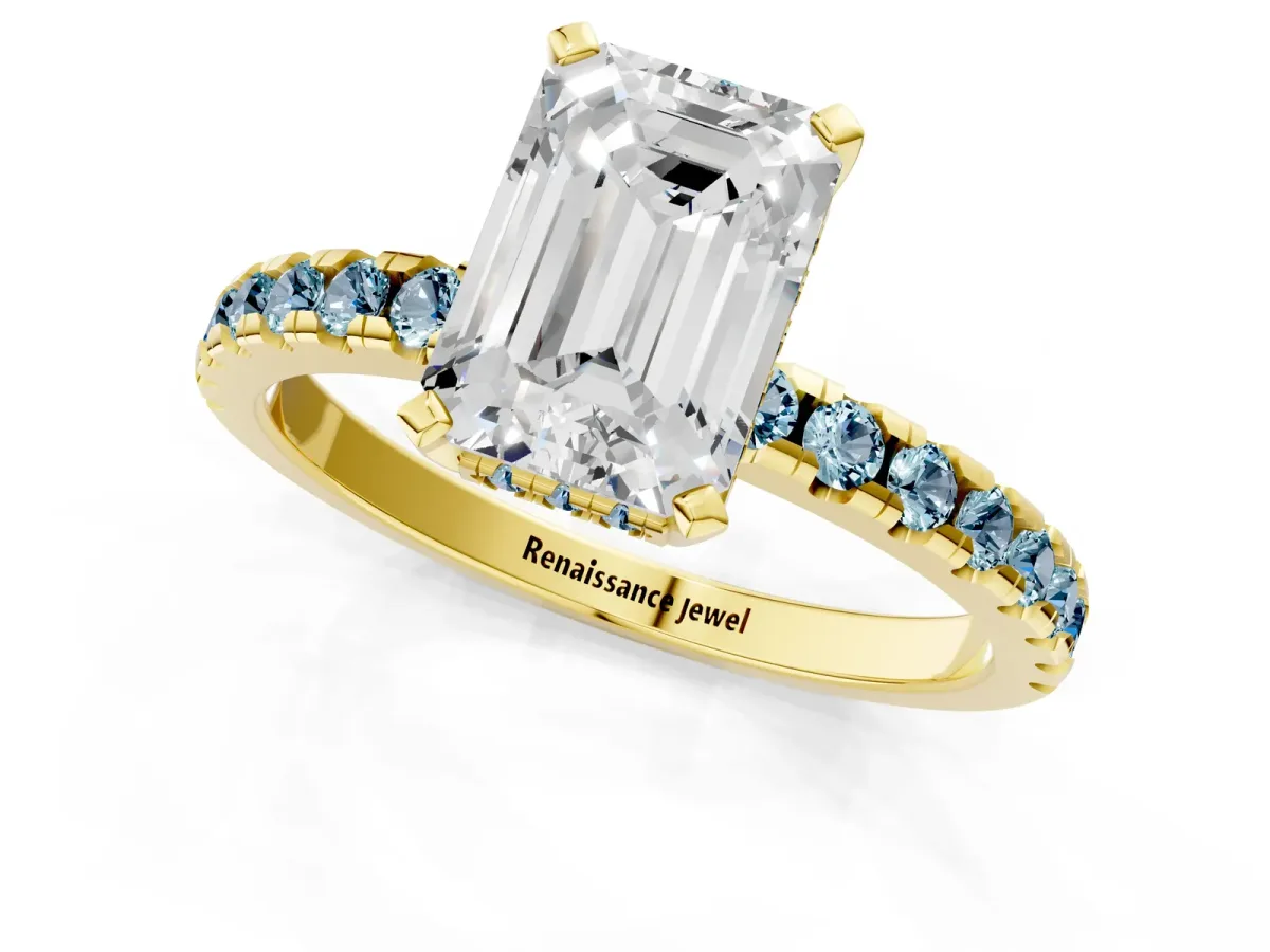 Emerald Cut Diamond Solitaire Ring with Round Aquamarine Pavé Band and Four-Prong Setting Yellow gold