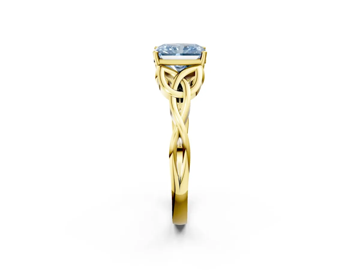 Fancy Blue Radiant Cut Diamond Solitaire Engagement Ring with Celtic Knot Band and Four-Prong Setting Yellow gold