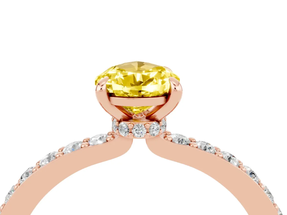 Pear Cut Yellow Sapphire Solitaire Engagement Ring with Pavé Band and Four-Prong Setting Rose gold