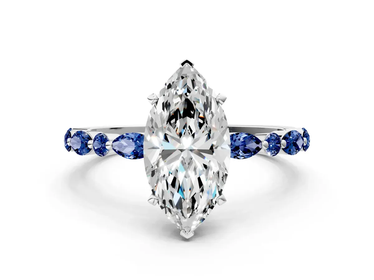 Marquise Cut Diamond Ring with Marquise and Round Blue Sapphire Side Stones and Four-Prong Setting Platinum