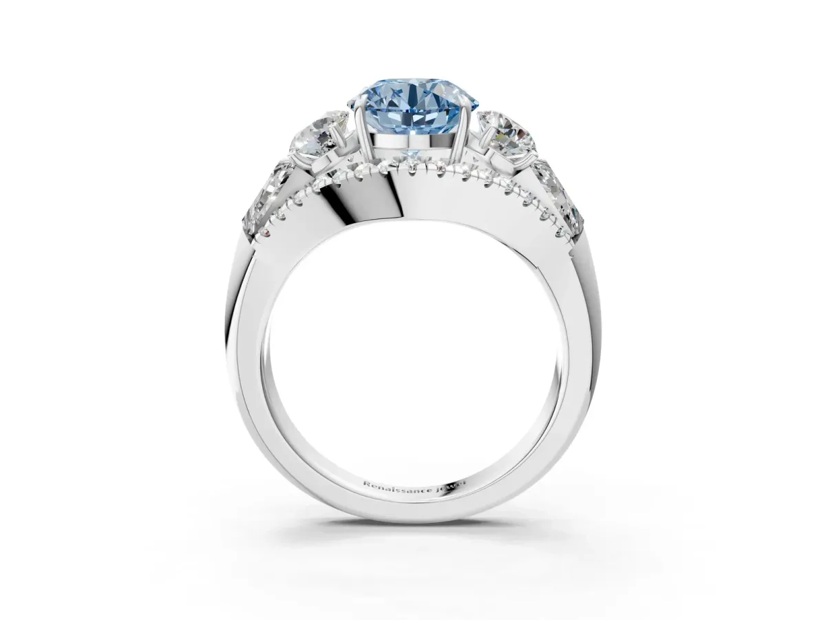 Fancy Blue Three-Stone Round Cut Diamond Engagement Ring with Pave Band and Prong Setting Platinum