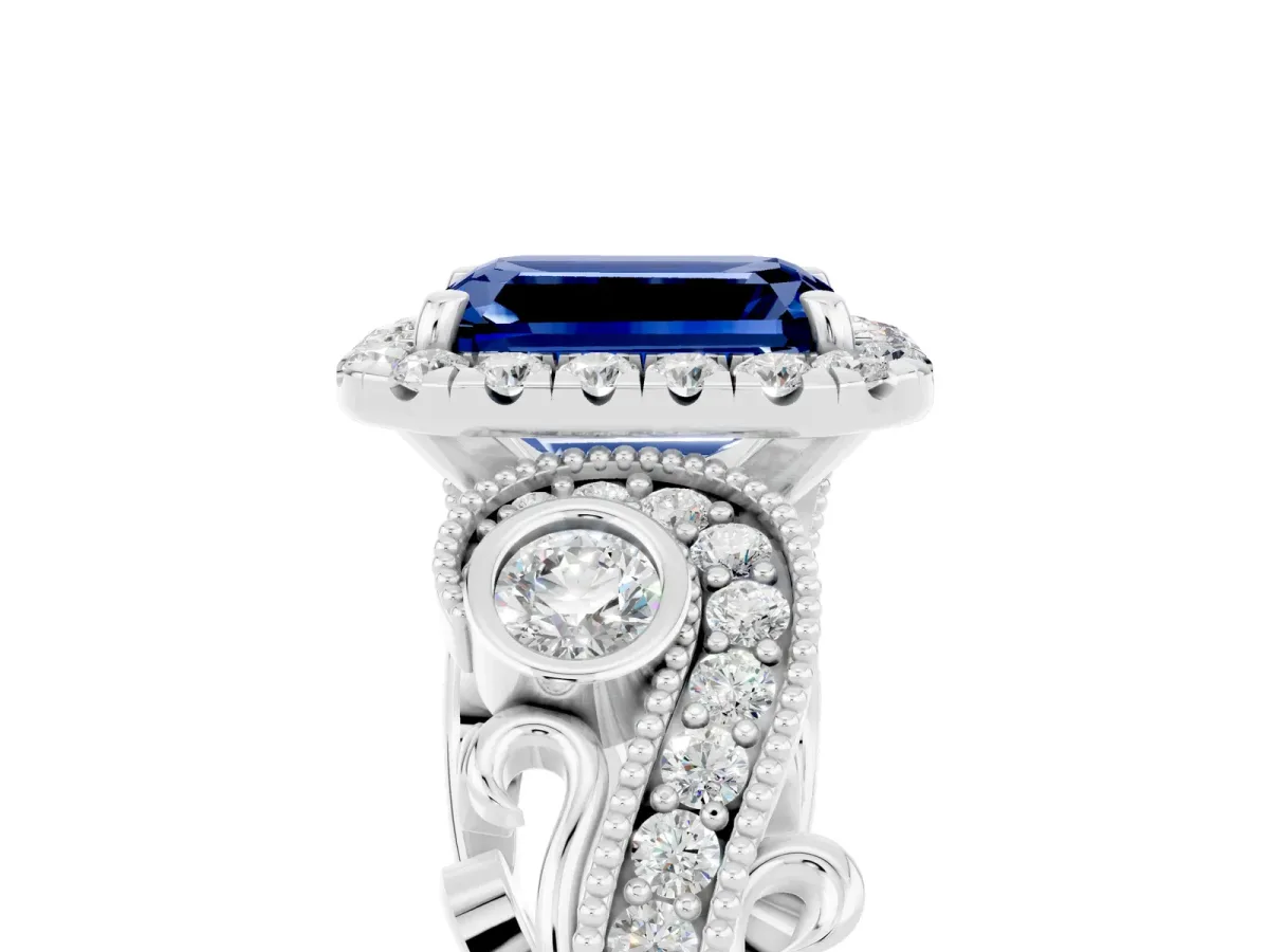 Emerald Cut Blue Sapphire Halo Ring with Milgrain Pavé Band and Four-Prong Setting White gold