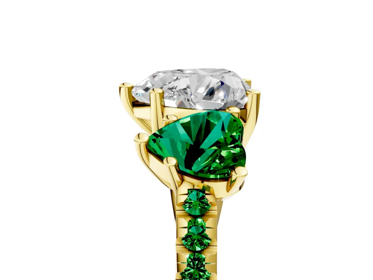 Three-Stone Heart Cut Diamond Ring with Round Emerald Pavé Band and Prong Setting Yellow gold