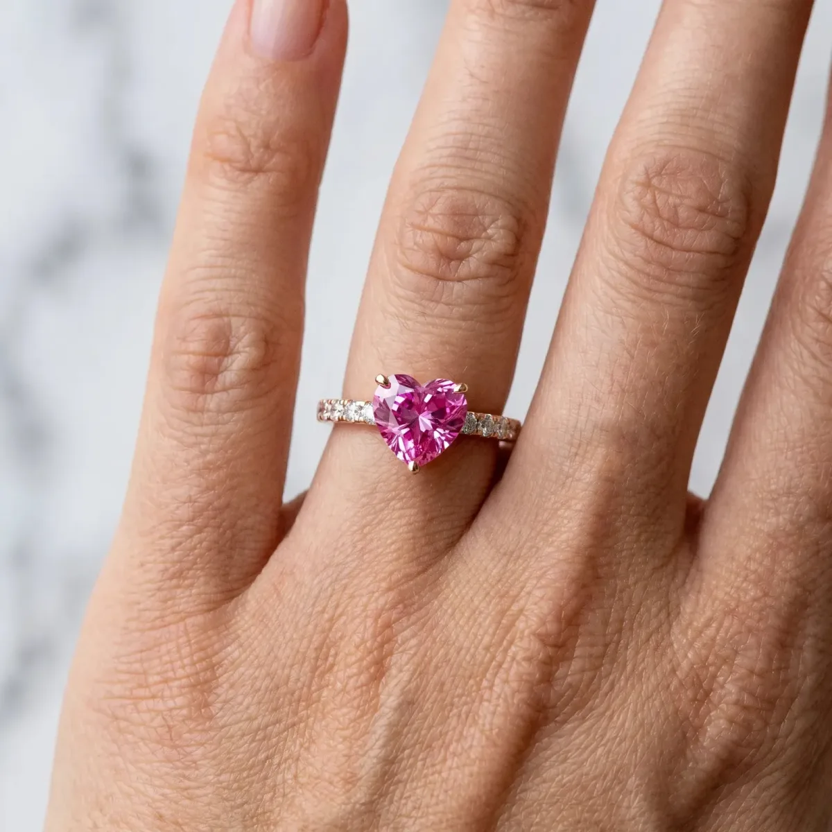 Heart Cut Pink Sapphire Solitaire Ring with Round Pavé Band and Four-Prong Setting Rose gold
