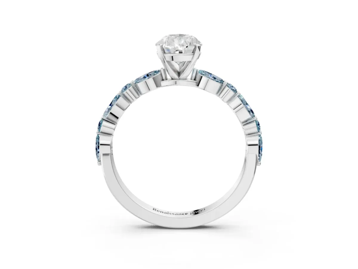Pear Cut Diamond Ring with Marquise and Round Aquamarine Side Stones and Four-Prong Setting White gold