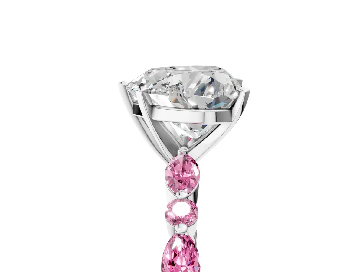 Heart Cut Diamond Ring with Marquise and Round Pink Sapphire Side Stones and Four-Prong Setting Platinum