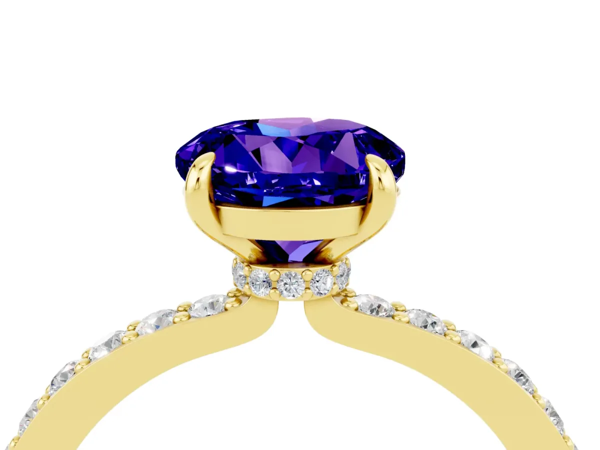 Round Cut Tanzanite Solitaire Engagement Ring with Pavé Band and Four-Prong Setting Yellow gold