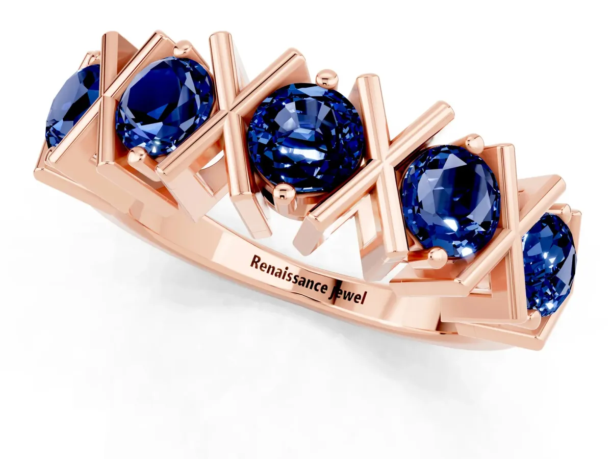 Round Blue Sapphire Channel Set Band with X-Prong Detail Rose gold