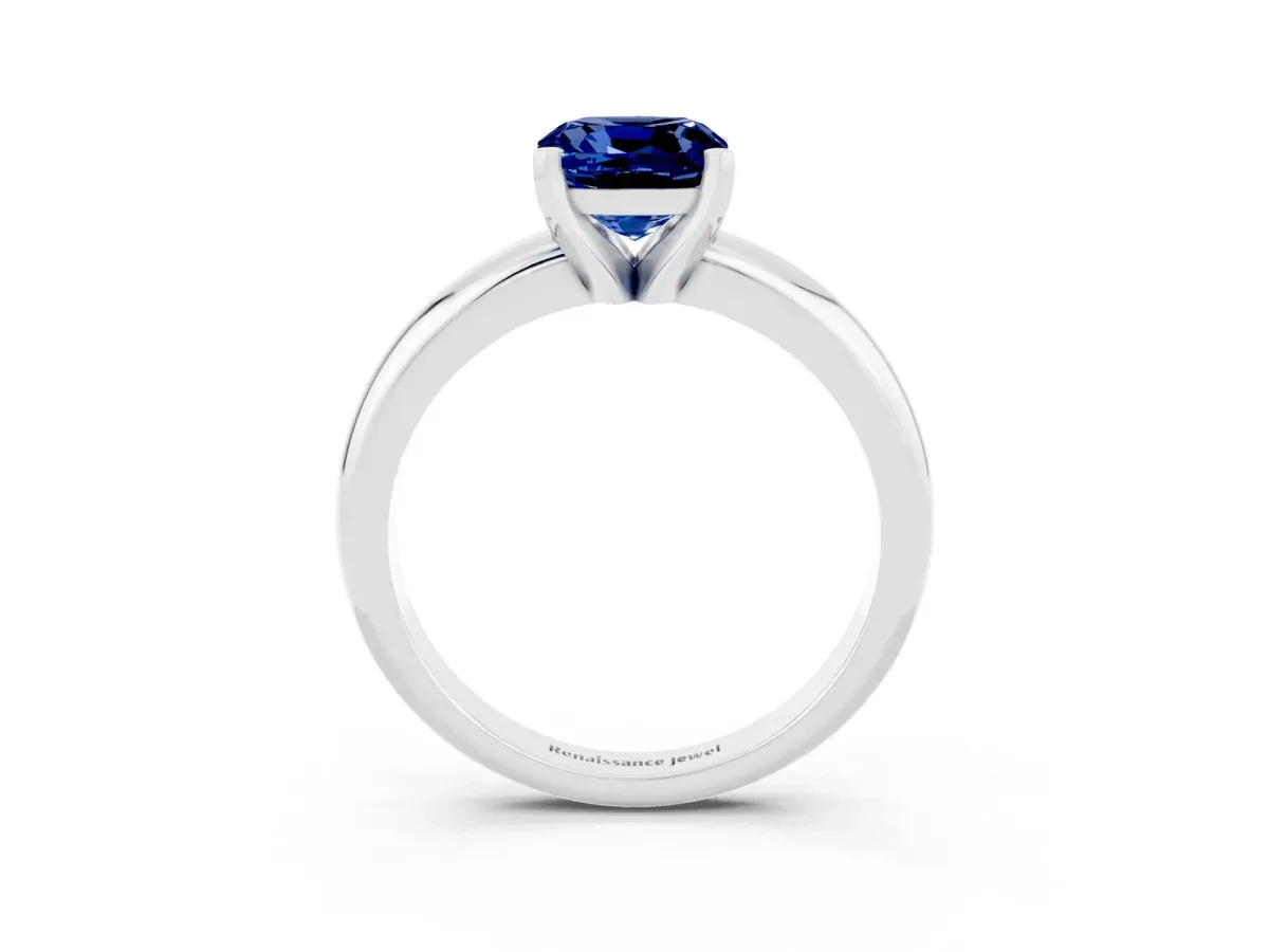 Cushion Cut Blue Sapphire Solitaire Engagement Ring with Round Band and Four-Prong Setting White gold