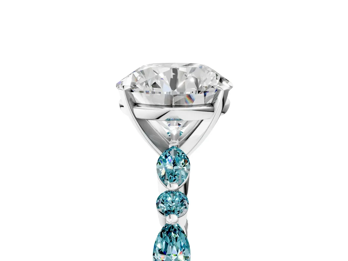 Round Cut Diamond Ring with Marquise and Round Blue Topaz Side Stones and Four-Prong Setting White gold