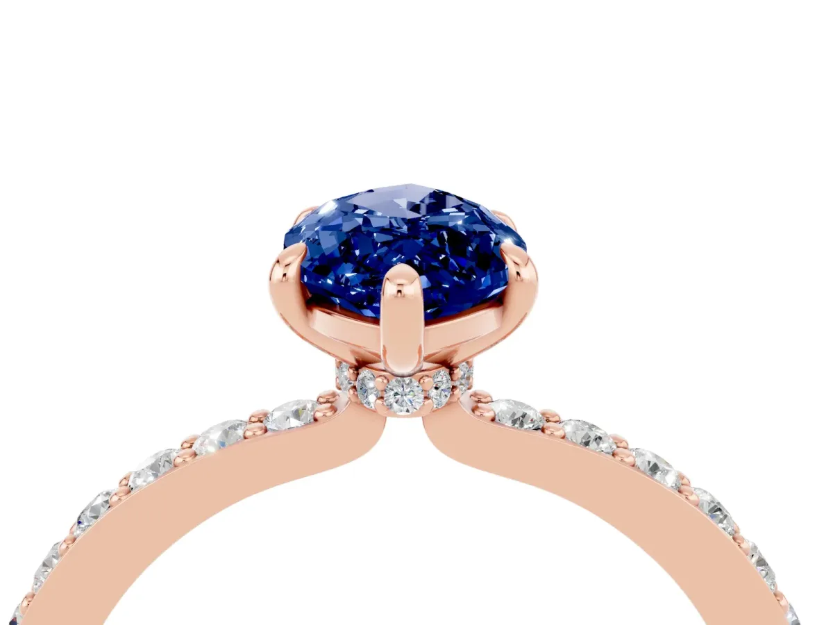 Marquise Cut Blue Sapphire Solitaire Engagement Ring with Pavé Band and Four-Prong Setting Rose gold