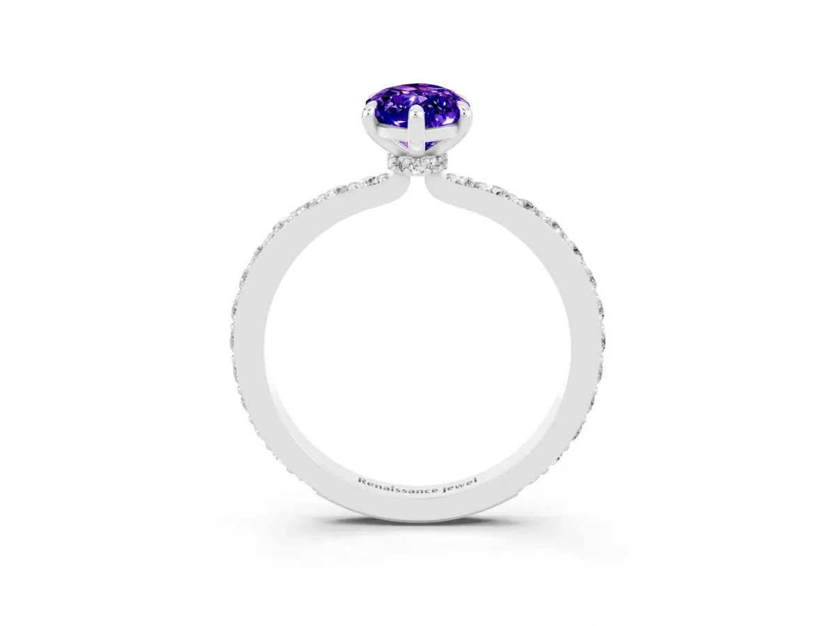 Marquise Cut Tanzanite Solitaire Engagement Ring with Pavé Band and Four-Prong Setting White gold