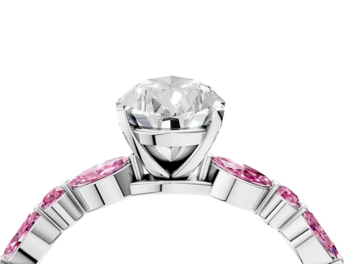 Pear Cut Diamond Ring with Marquise and Round Pink Sapphire Side Stones and Four-Prong Setting White gold