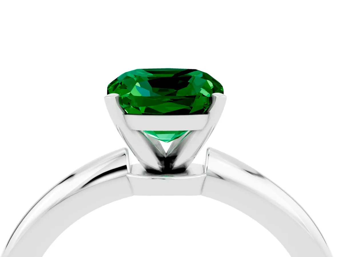 Cushion Cut Emerald Solitaire Ring with Six-Prong Setting and Classic Band Platinum