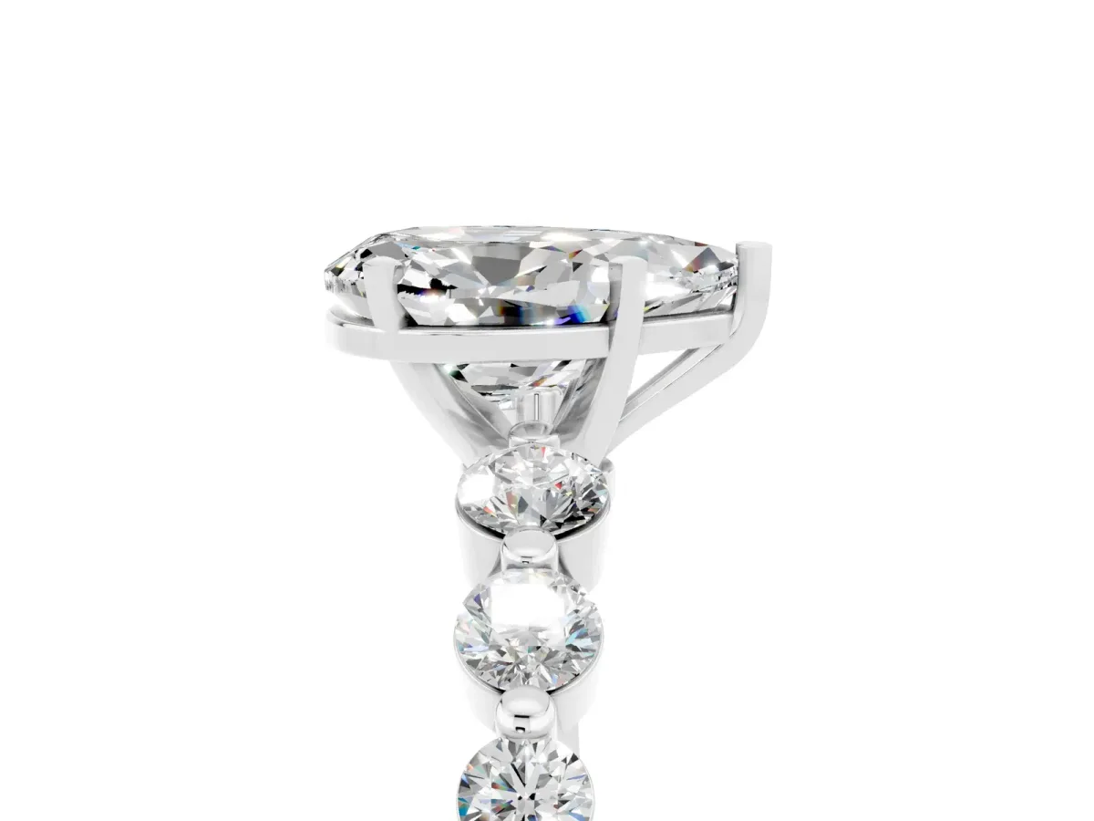 Pear Cut Solitaire Moissanite Ring with Pave Band and Four-Prong Setting Silver