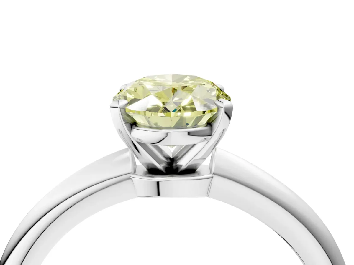 Fancy Yellow Oval Cut Diamond Solitaire Ring with Six-Prong Setting and Classic Band Silver