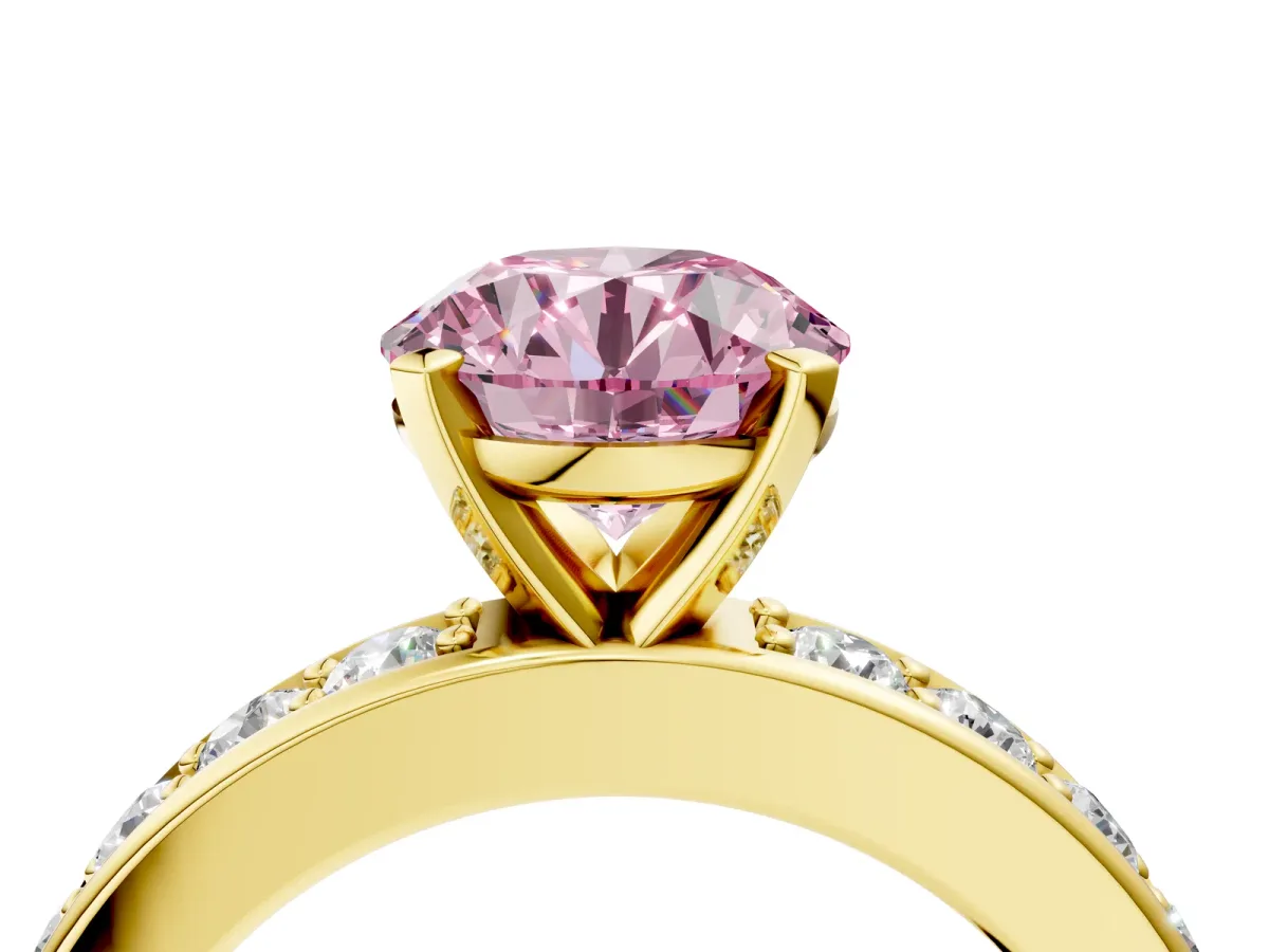 Fancy Pink Round Cut Diamond Engagement Ring with Channel Set Round Band and Prong Setting Yellow gold