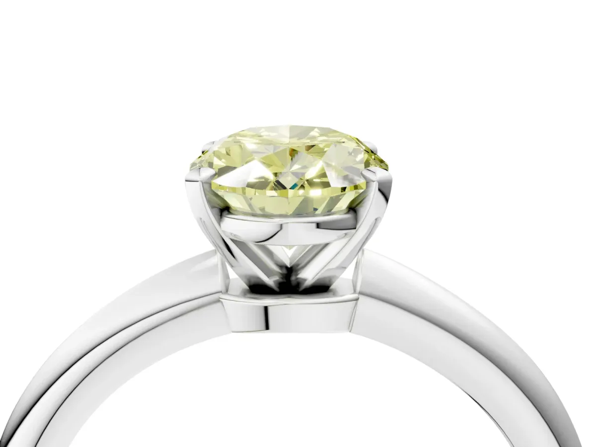 Fancy Yellow Oval Cut Diamond Solitaire Ring with Six-Prong Setting and Classic Band Silver