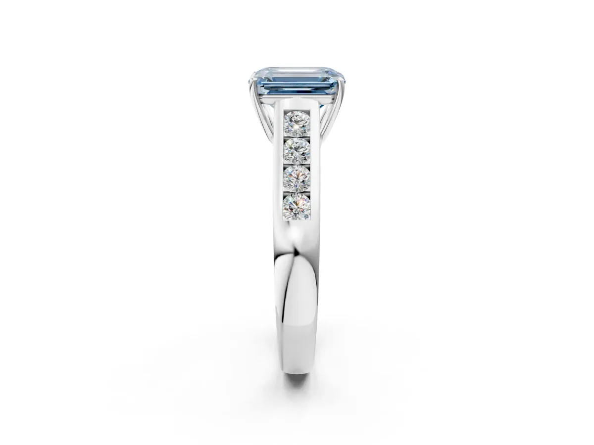 Fancy Blue Emerald Cut Brilliant Channel-Set Solitaire Ring with Four-Prong Setting White gold