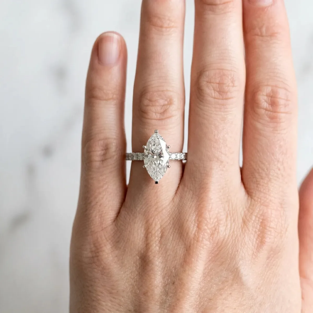 Marquise Cut Diamond Pavé Solitaire Ring with Round Band and Prong Setting Silver