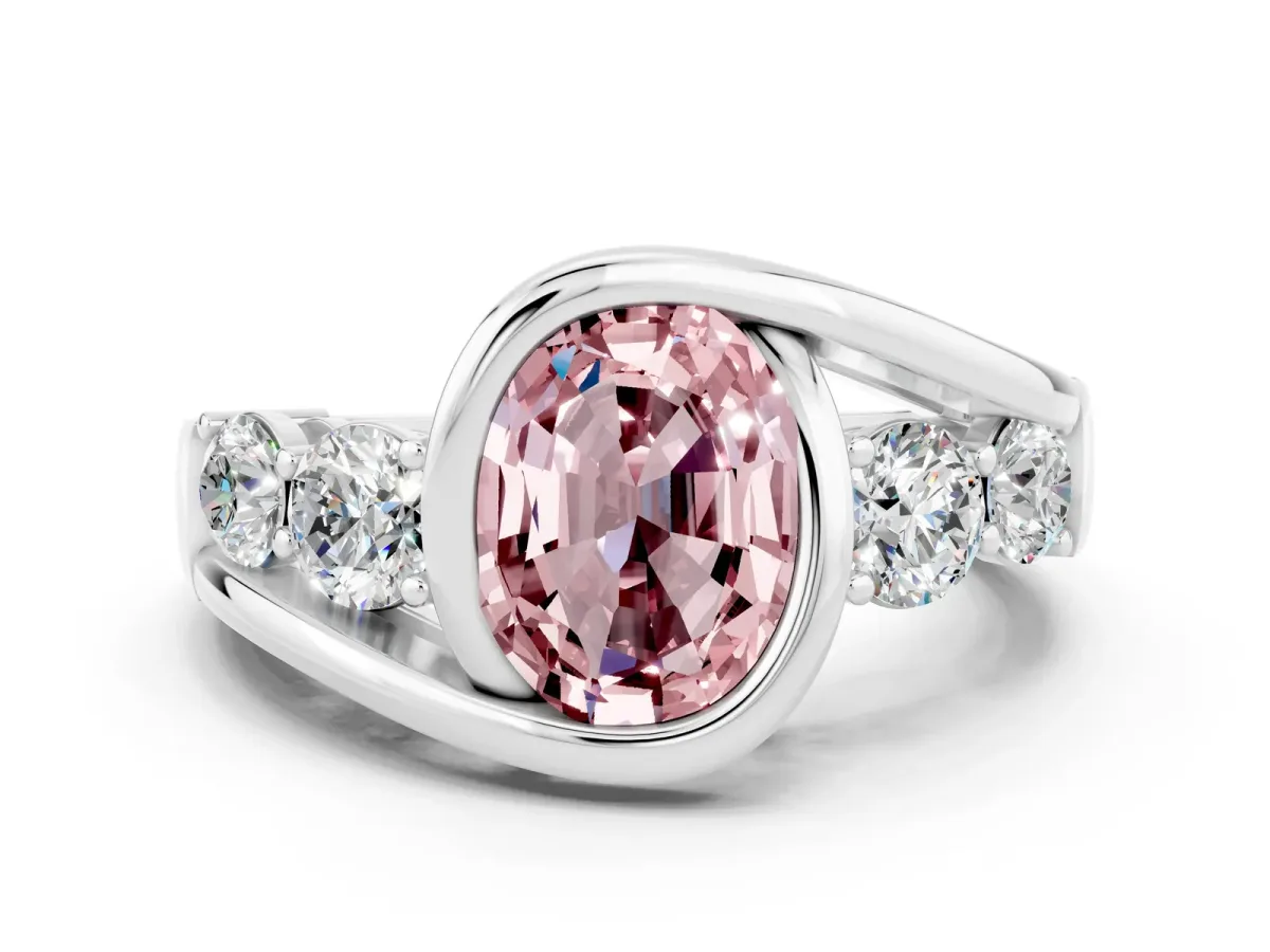 Bezel Set Oval Cut Morganite Bypass Ring with Round Accents Platinum